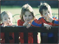 Three children in park