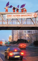 Fathers 4 Justice members dressed as Father Christmases on the Strand bridge, Liverpool