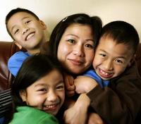 Thao Thi Tran with Andy, 10, Danny, 8, and Claudia, 6.