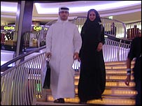 Married couple in shopping mall in Dubai