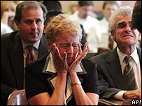 Carol Ernst reacts to the verdict in court