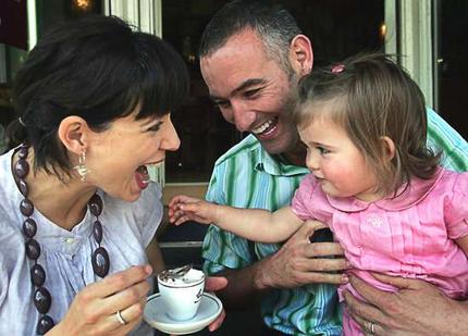 Wiggly wooing ... Anthony Field with wife Mikaela and daughter
Lucia.