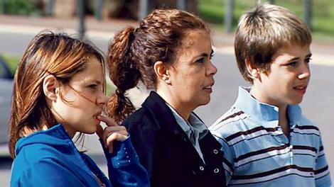 Second chance ... David Hicks's children, 14-year-old Bonnie and
12-year-old Terry, with their mother, Jodie Sparrow.
